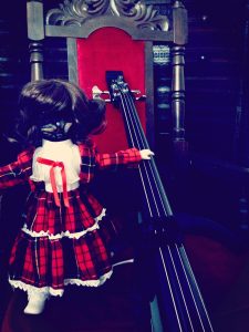 Laceface doll and Laceface's electric cello